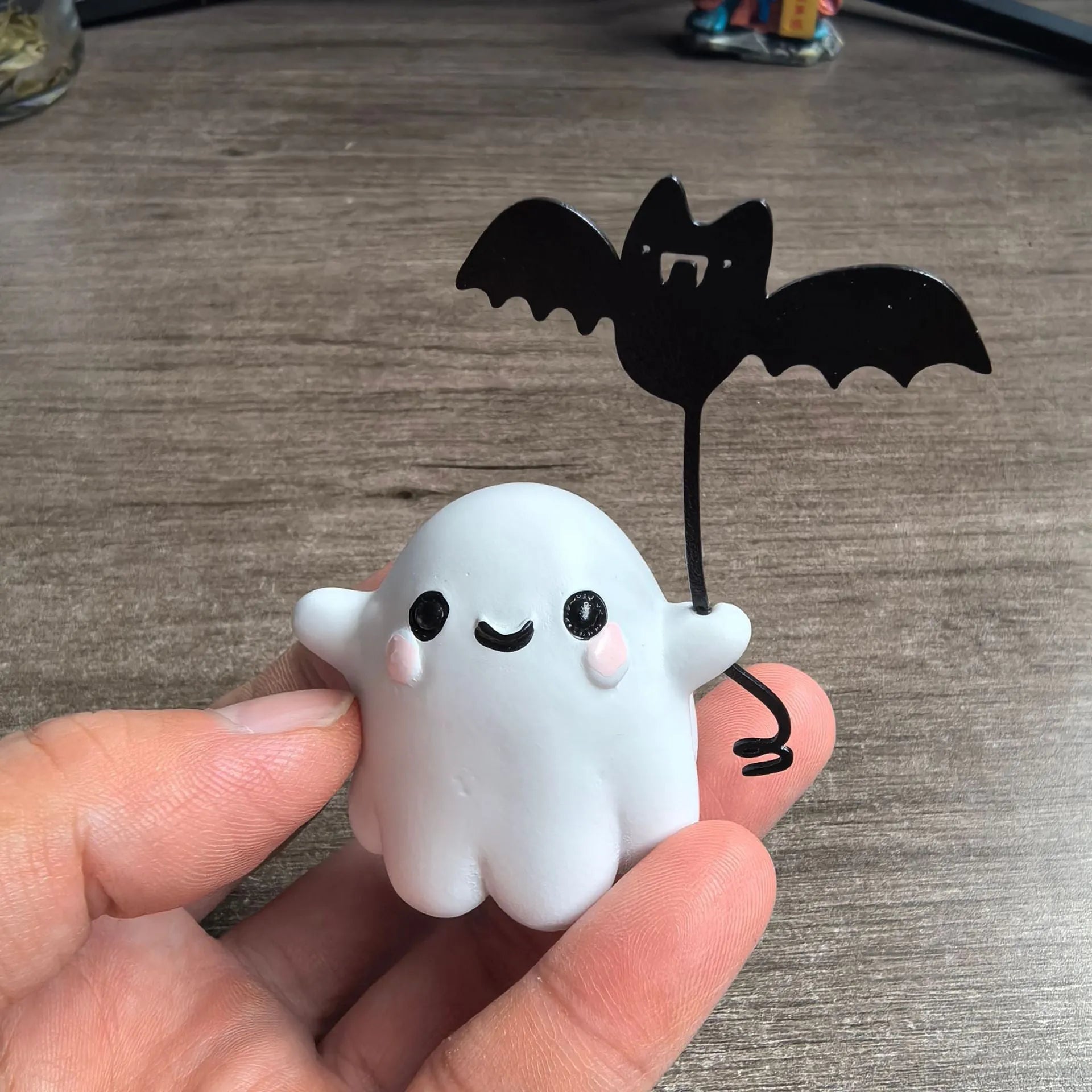 Mini ghost holding bat walking dog resin statue Halloween decoration measuring 4x5x4cm