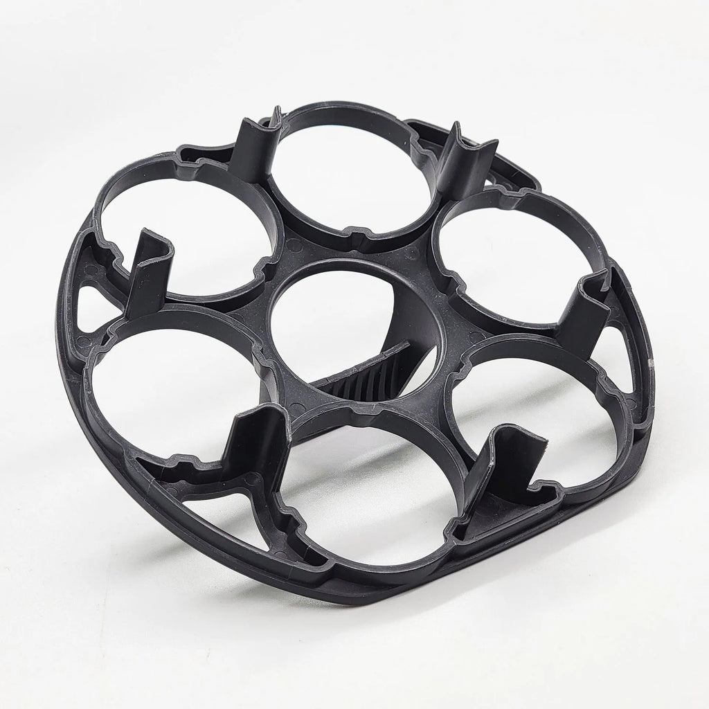 Black plastic egg holder basket for cooking machines measuring 13.8 x 12.6 x 5.7 cm