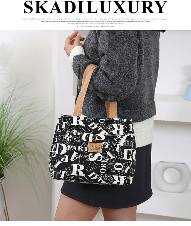 Women's printed canvas tote bag with aluminium frame in a square shape, showing floral and typographic design options.