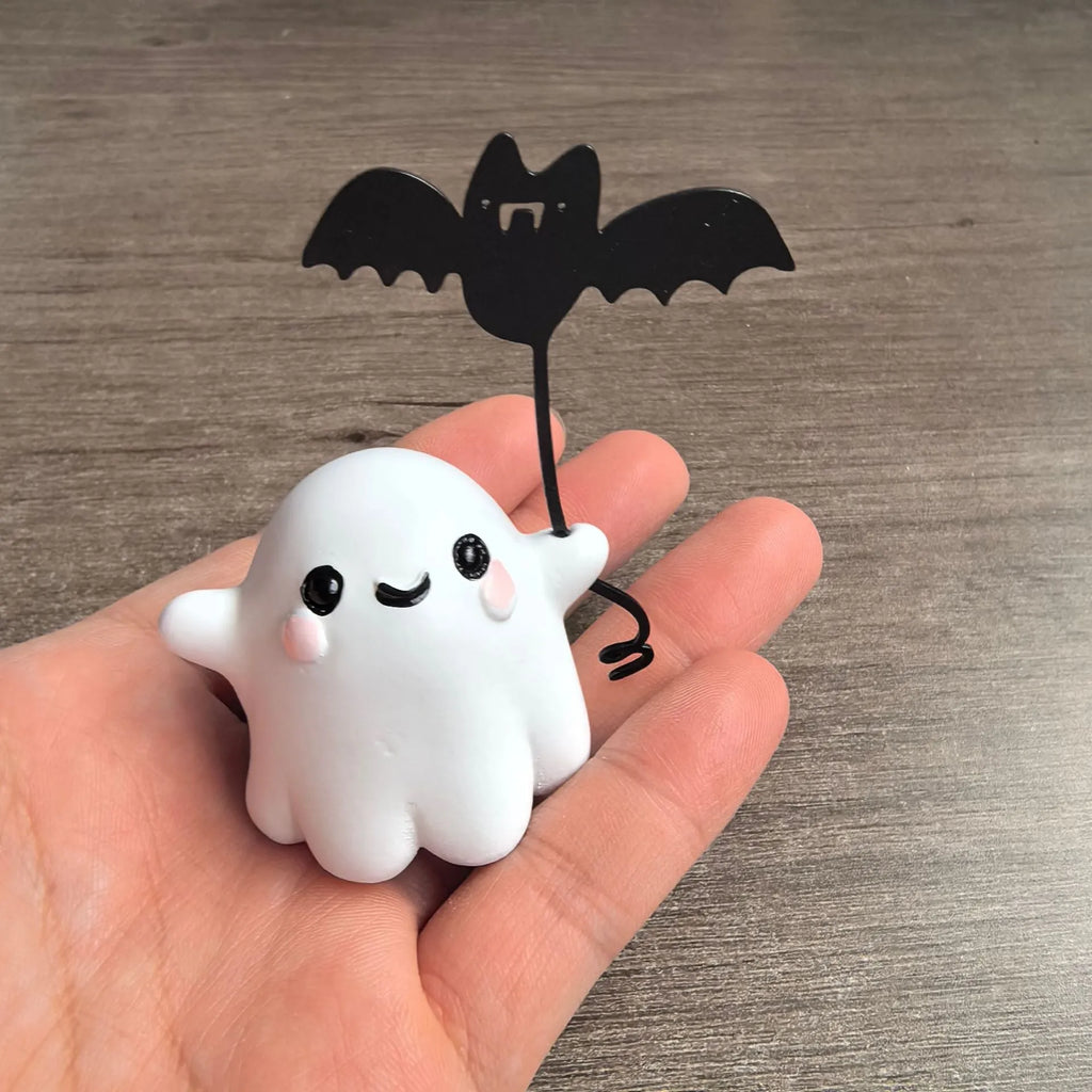 Mini ghost holding bat walking dog resin statue Halloween decoration measuring 4x5x4cm