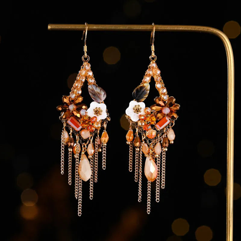 Hand-woven Bohemian diamond-shaped earrings in artificial crystal and alloy, available in three colours