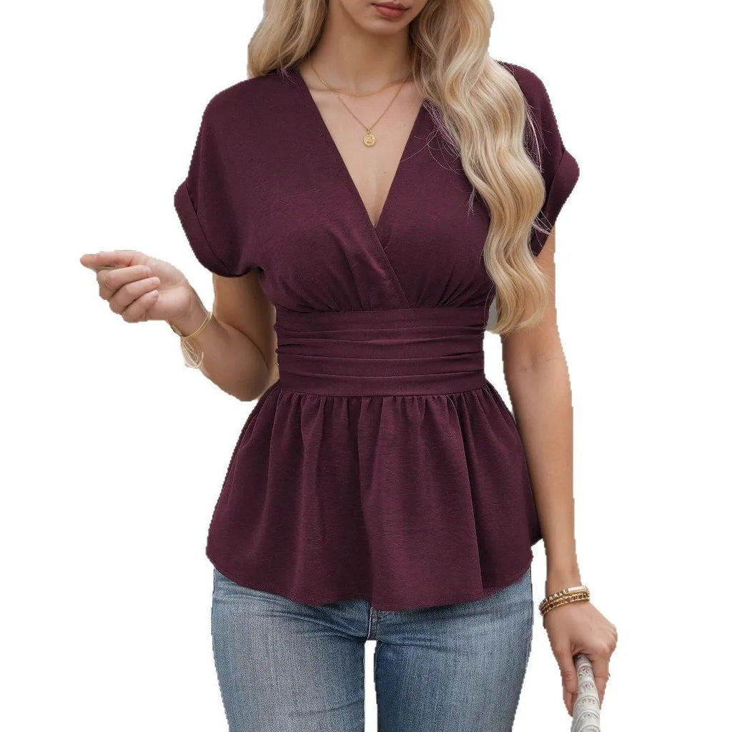 Women's slim fit V-neck polyester summer top in solid colour with short sleeves.