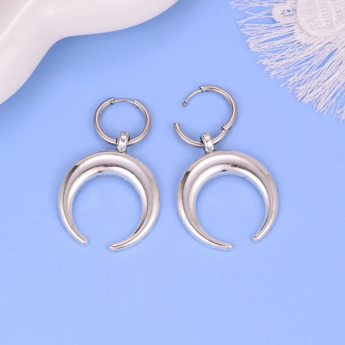 Silver Gothic moon geometric hoop earrings with ear clip fastening