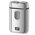 Rechargeable portable electric shaver with floating cutter head and LCD display, shown in black colour.