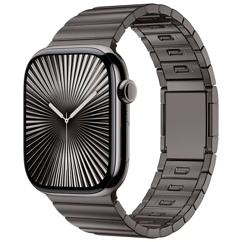 Stainless steel Apple Watch strap with magnetic fold-over buckle in silver colour.