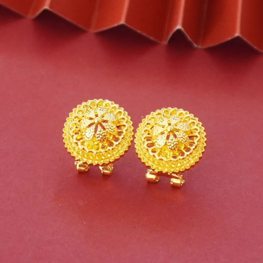 Gold-plated three-piece jewellery set with flower design, including necklace, earrings and ring