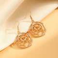 Women's spiral donut jewellery set showing necklace, bracelet and earrings in gold finish