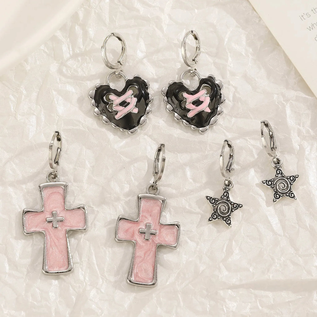 Women's alloy earrings with cross crystal designs in white, black cat, and antique silver colour options