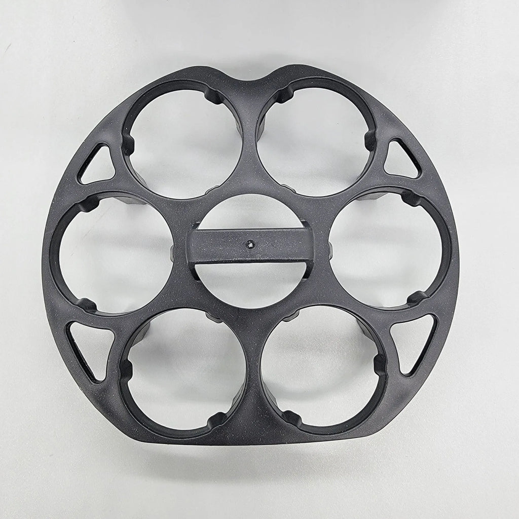Black plastic egg holder basket for cooking machines measuring 13.8 x 12.6 x 5.7 cm