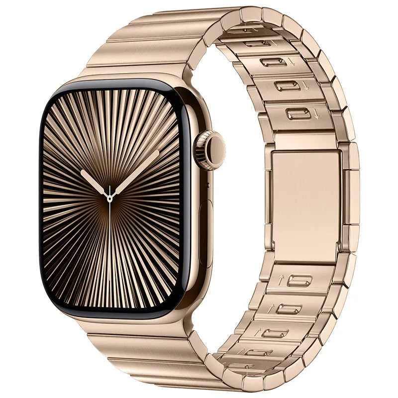 Stainless steel Apple Watch strap with magnetic fold-over buckle in silver colour.