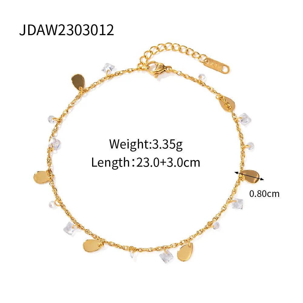 Silver-tone stainless steel anklet with a geometric water drop tassel charm on an adjustable chain.