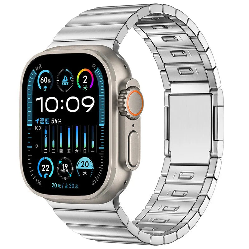 Stainless steel Apple Watch strap with magnetic fold-over buckle in silver colour.
