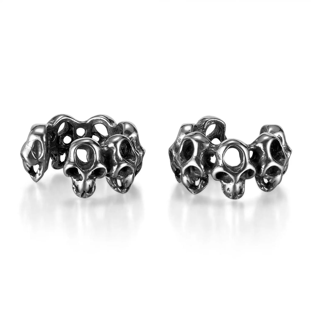 Stainless steel skull earrings with hollow geometric design and ear clip fastening