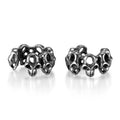 Stainless steel skull earrings with hollow geometric design and ear clip fastening