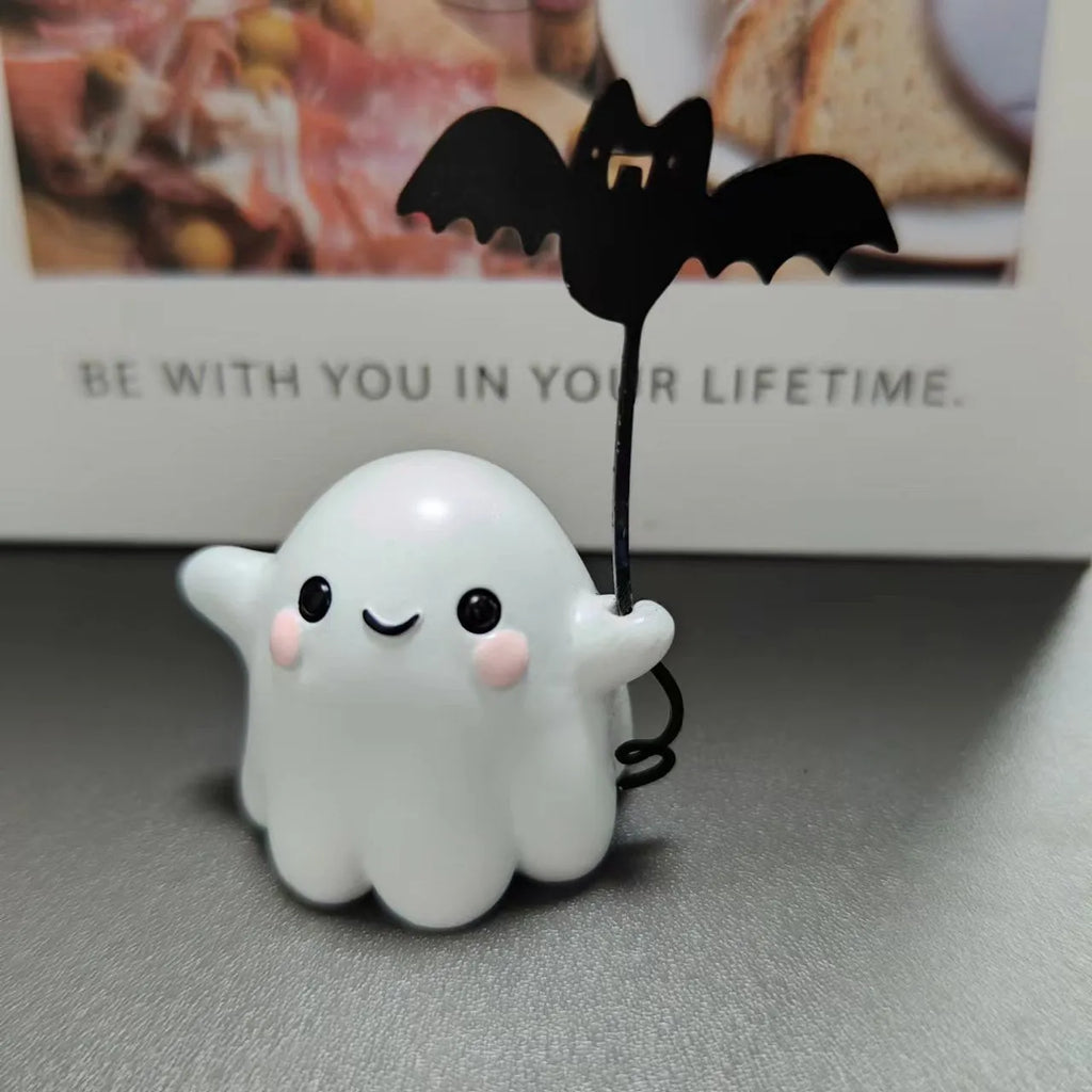 Mini ghost holding bat walking dog resin statue Halloween decoration measuring 4x5x4cm