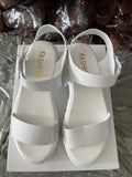 Women's beige peep toe ankle-strap buckle platform sandals in college style on a white background.