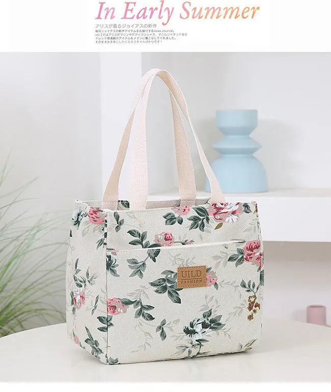 Women's printed canvas tote bag with aluminium frame in a square shape, showing floral and typographic design options.
