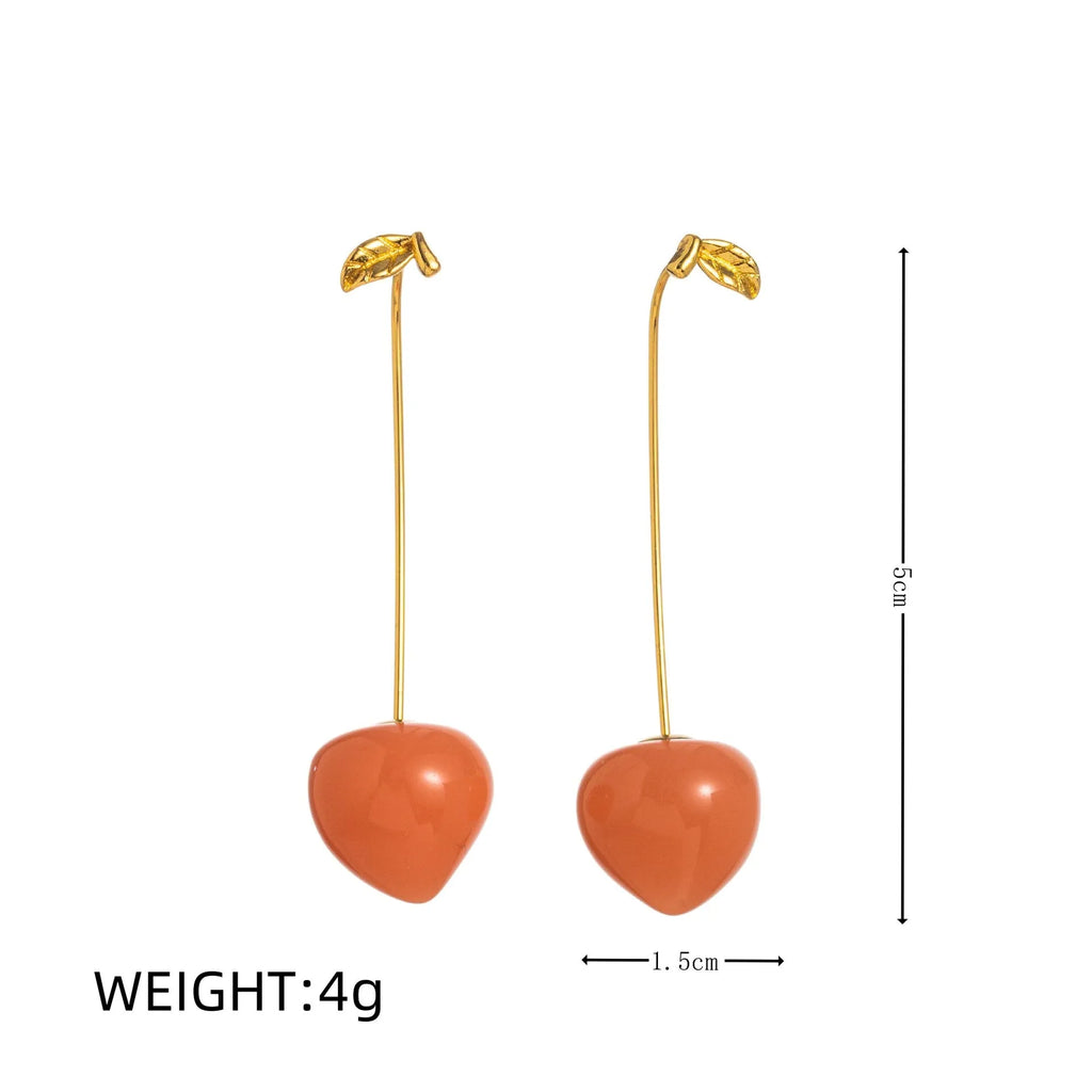 Gold plated fruit and vegetable design earrings in seven colours including carrot, blueberry and lemon options
