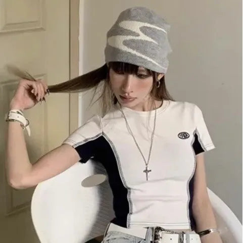 Acrylic thermal beanie hat in white colour showing woolen-style knitting texture