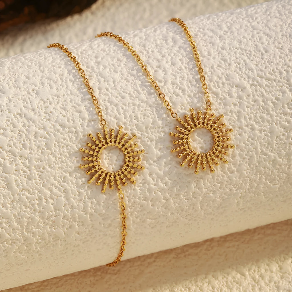 Gold-tone geometric chain necklace and bracelet set with sunflower design on stainless steel