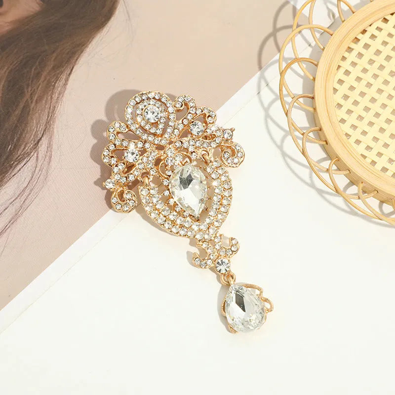 Women's alloy drop shape retro brooch in gold colour for decoration