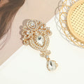Women's alloy drop shape retro brooch in gold colour for decoration