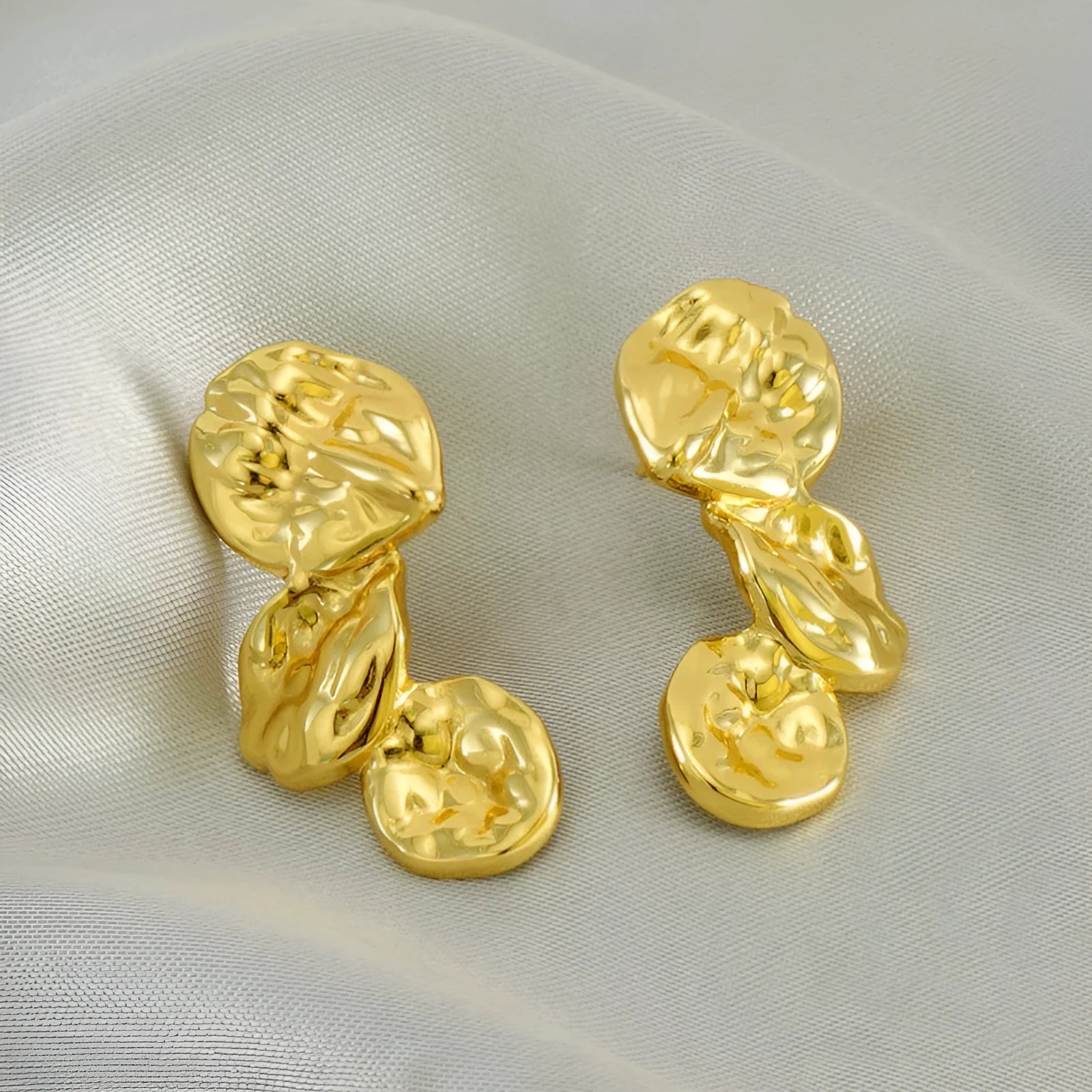 Gold stainless steel vintage petal earrings with irregular geometric shape and asymmetric folding design