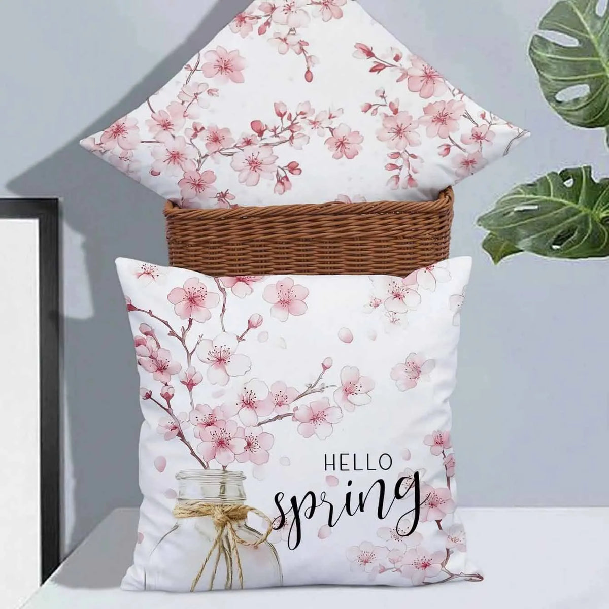 45cm square short velvet cushion cover with detailed cherry blossom and script letter floral print design.