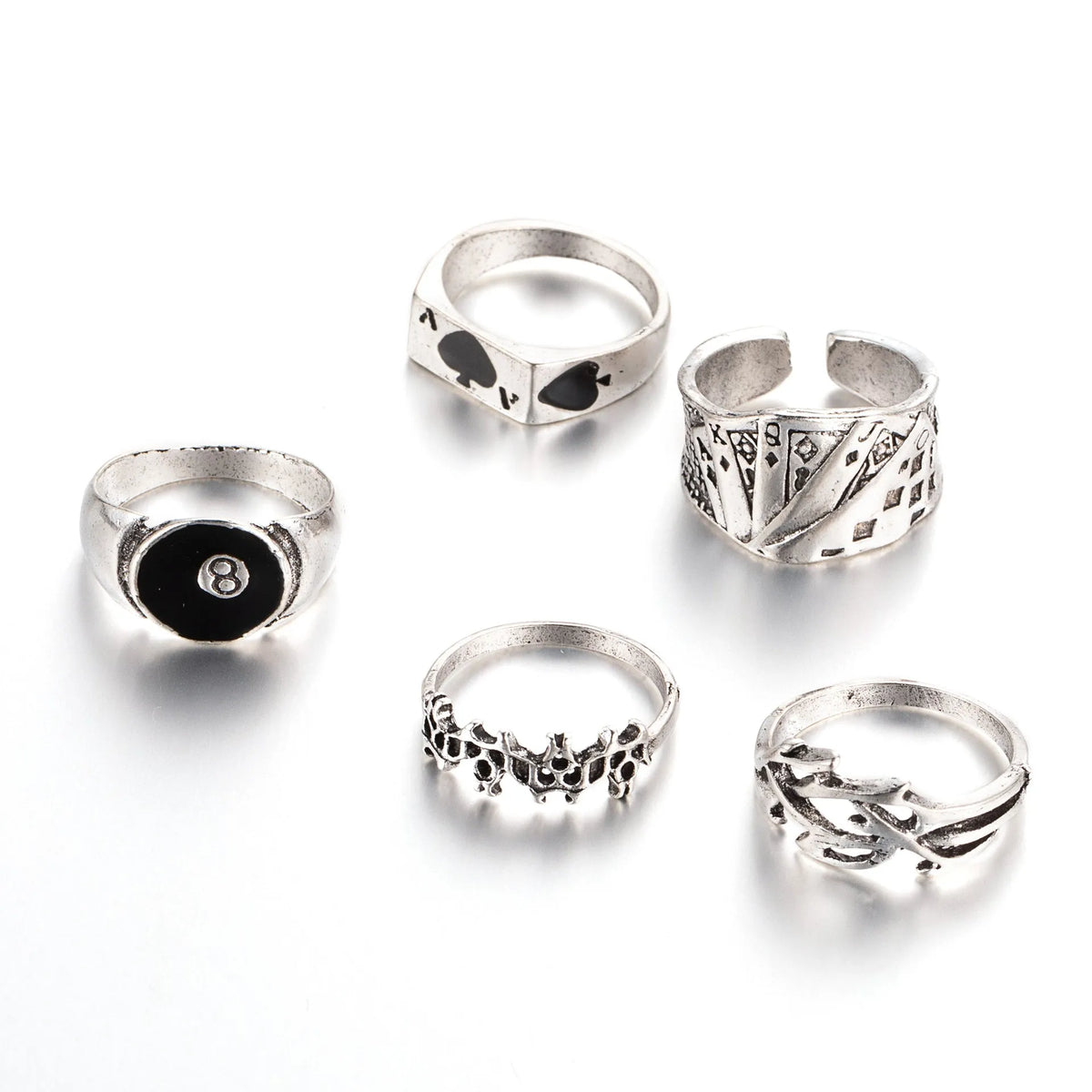 Black alloy poker ring with a raised retro spade card design on its face.