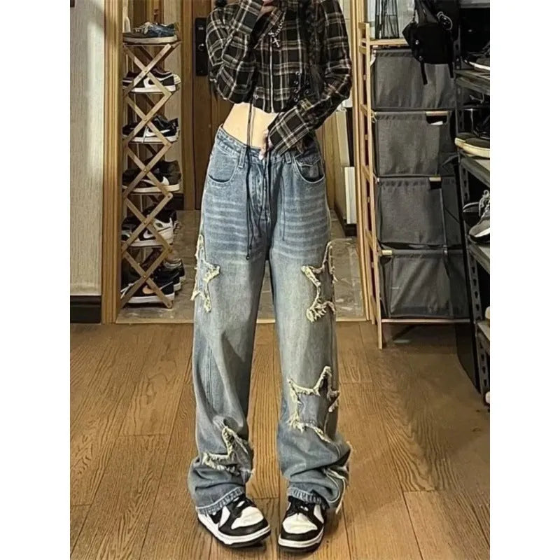 Women's blue straight-leg jeans with high waist and washed denim finish
