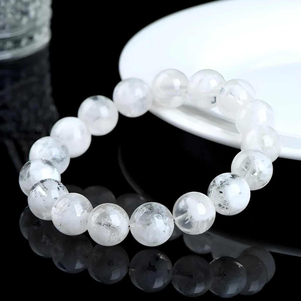 Women's crystal beaded bracelet with blizzard snowflake round beads and Ruyi Xiangyun design.