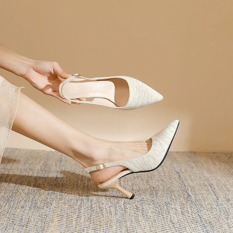 Women's stiletto slingback sandals in black or apricot with 5cm or 7cm heel, cloth upper and rubber sole.