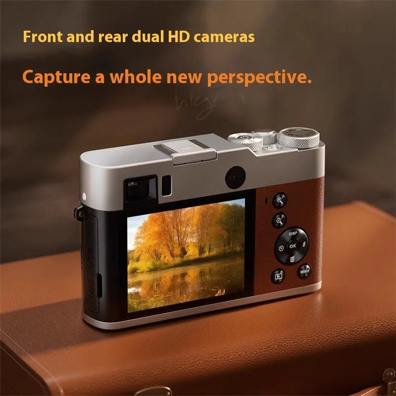 Black or brown 5K digital camera with dual lenses, optical viewfinder, and 2.88-inch screen.