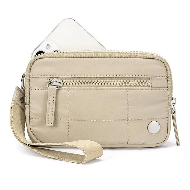 Waterproof quilted handbag with transparent deck section in nylon material