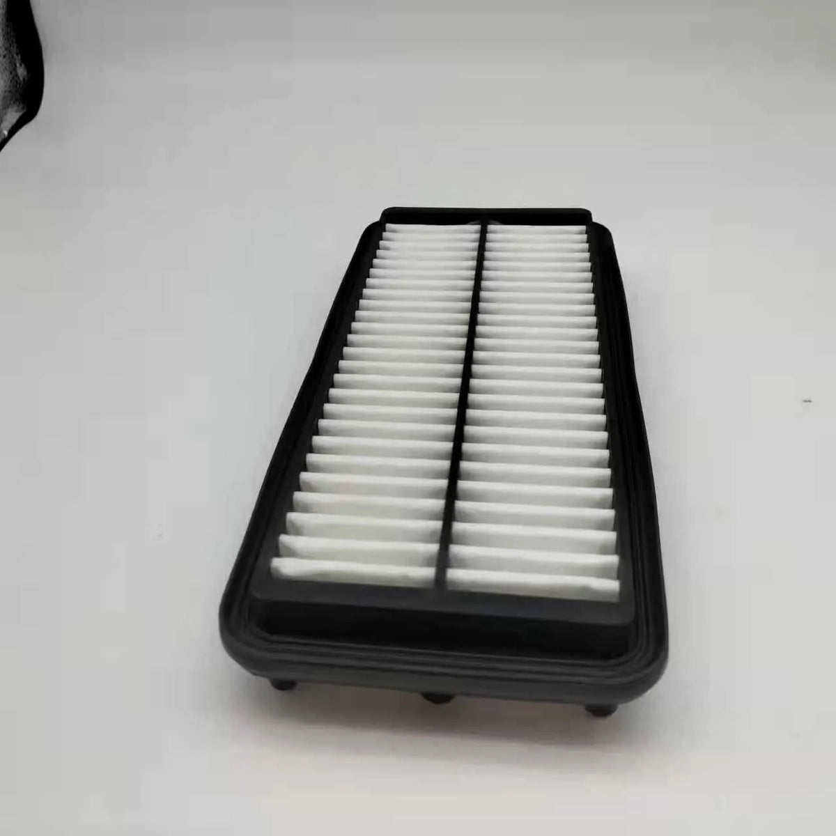 Black car air filter for Modern vehicles measuring 256x113x40mm