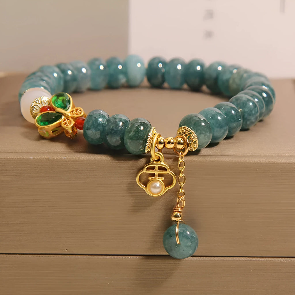 Blue water jade abacus beads crystal bracelet with butterfly clasp and white agate accents