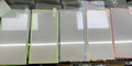 Fluorescent tempered glass full screen protector for iPhone in pink, yellow, green, blue, and grass green luminous colours.