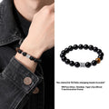 Men's obsidian prayer wheel bracelet with 10mm beads and hand-woven silver elements