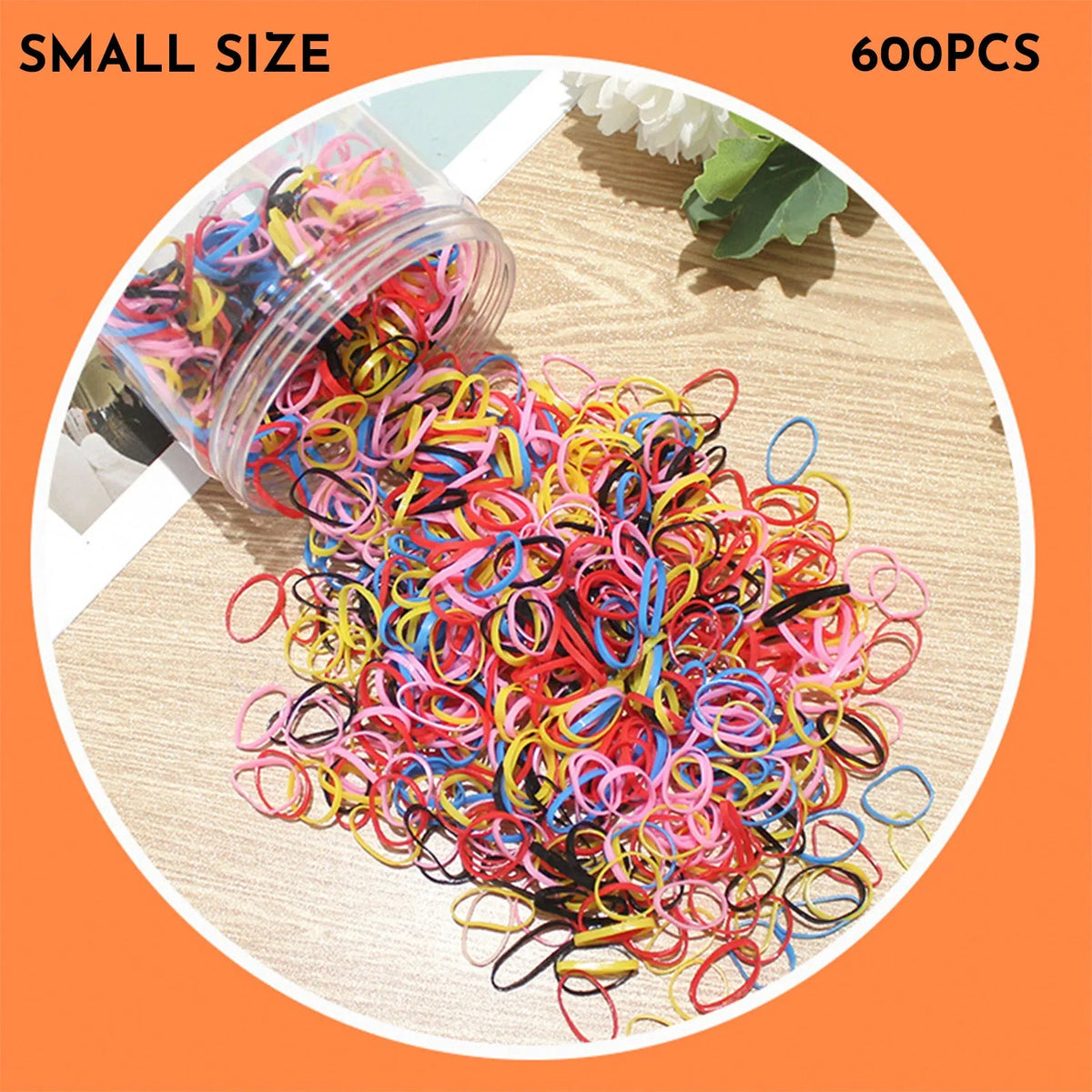 Multi-colour TPU baby hair elastic bands spilling from a reusable container.