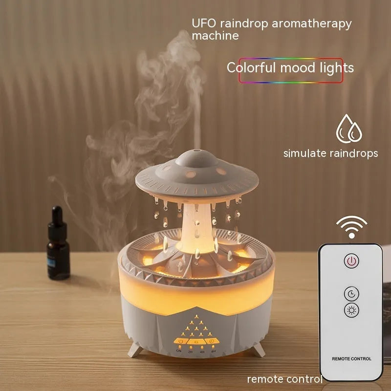 White UFO Raindrop Humidifier with 7-colour nightlight and essential oil diffuser on table