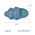 Blue shark-shaped rubber dog chew toy on a white background