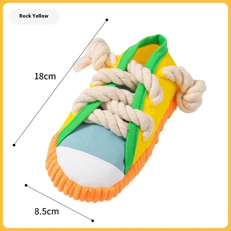Plastic dog slippers chew toy in yellow colour with bendable design and sound feature