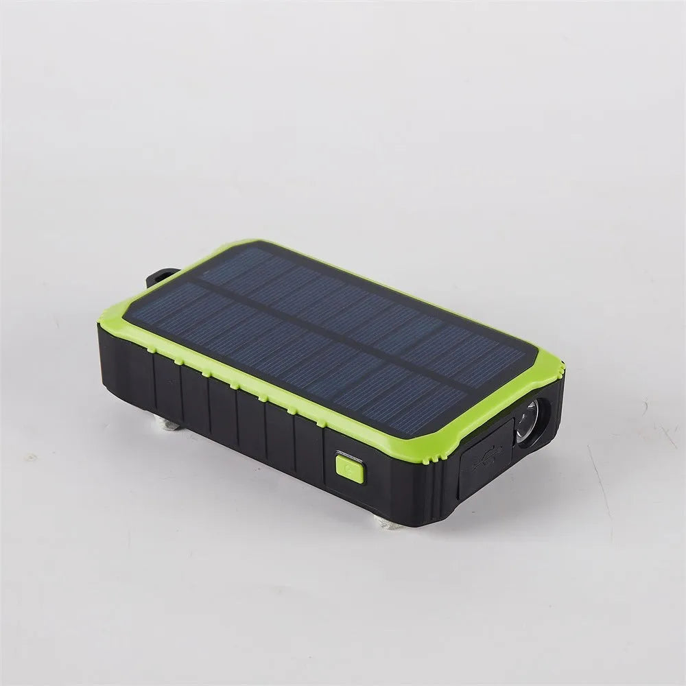 Orange and green hand solar mobile power bank with hand crank and dual USB ports