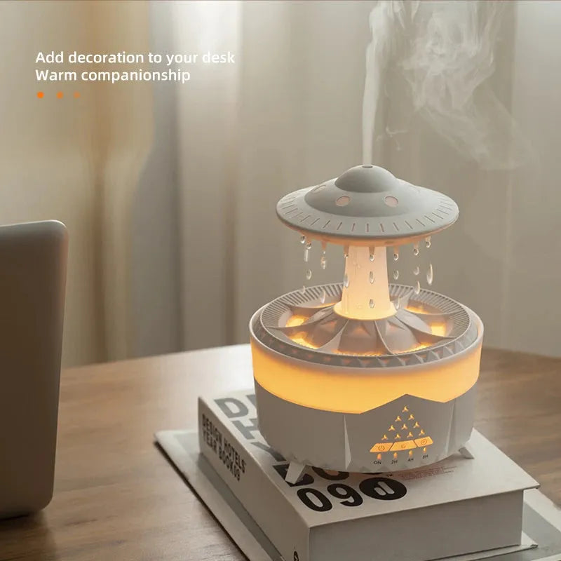 White UFO Raindrop Humidifier with 7-colour nightlight and essential oil diffuser on table