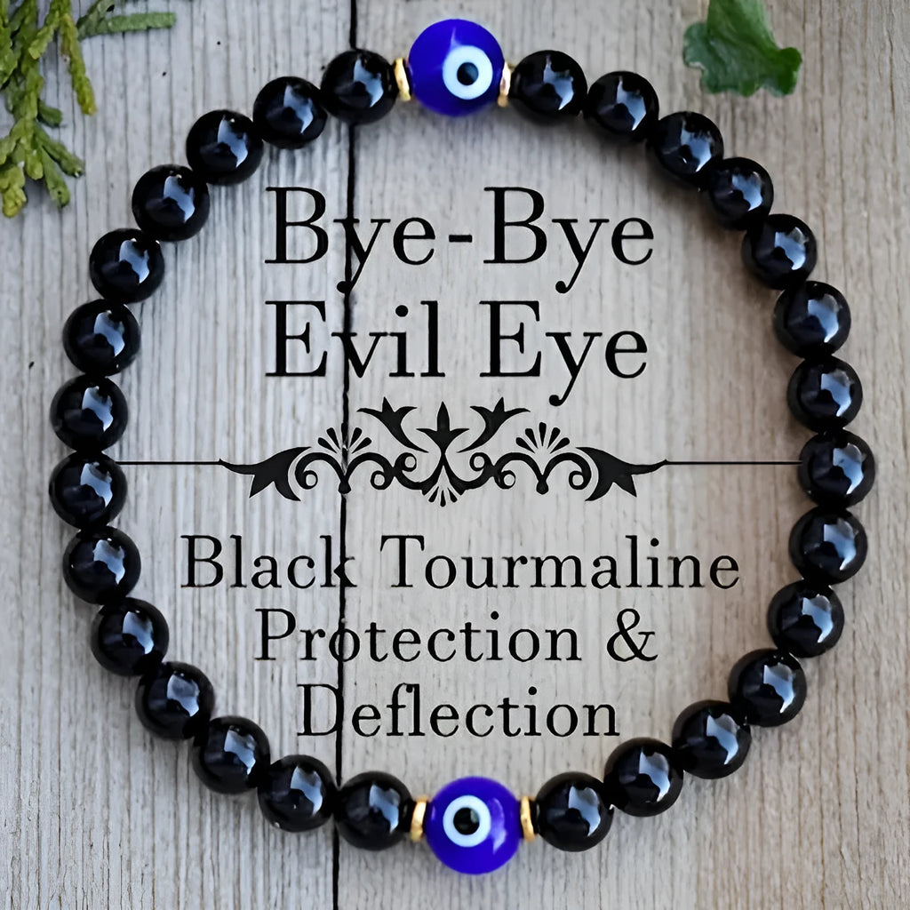 Men's black beaded bracelet with 8mm devil's eye beads and 6mm black beads in a geometric design.