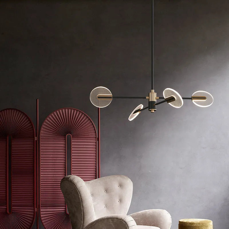 Iron and acrylic LED chandelier pendant light with multiple head options.