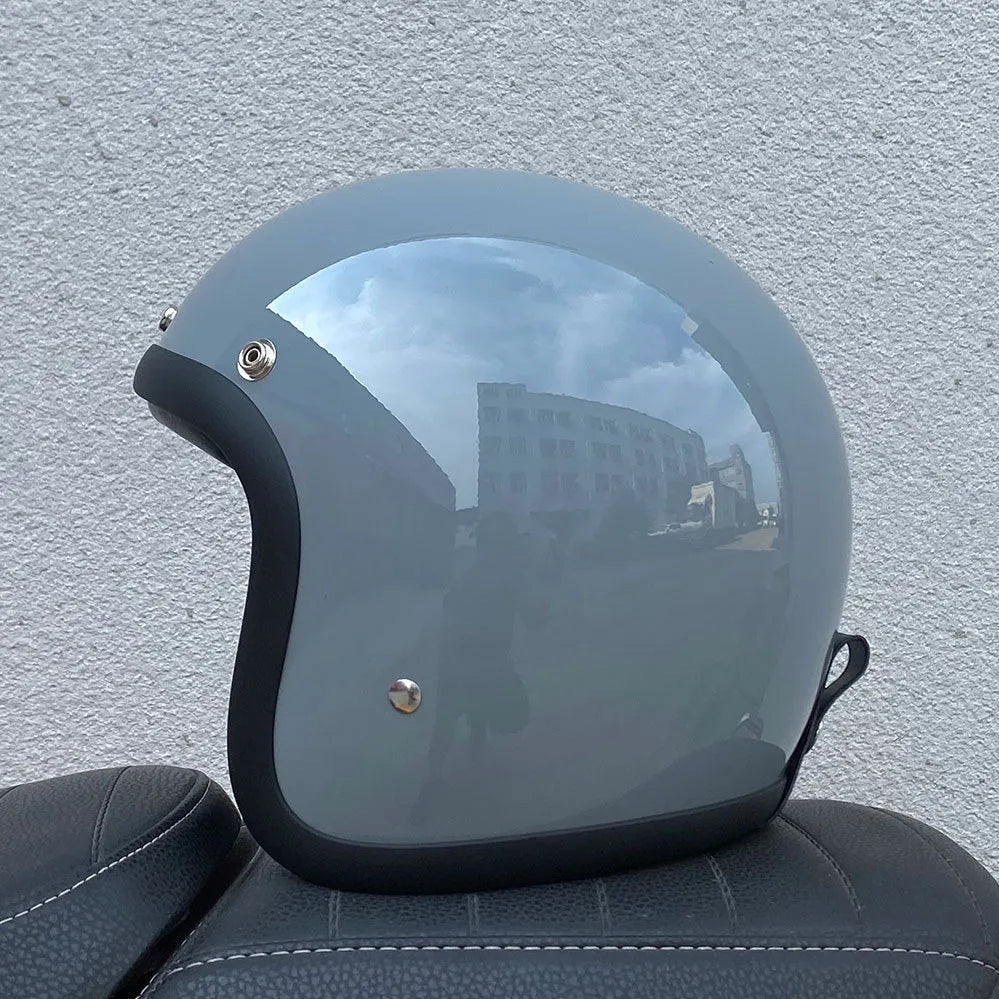 Retro-style glass fibre motorcycle half helmet shown in multiple colour options for adult commuters