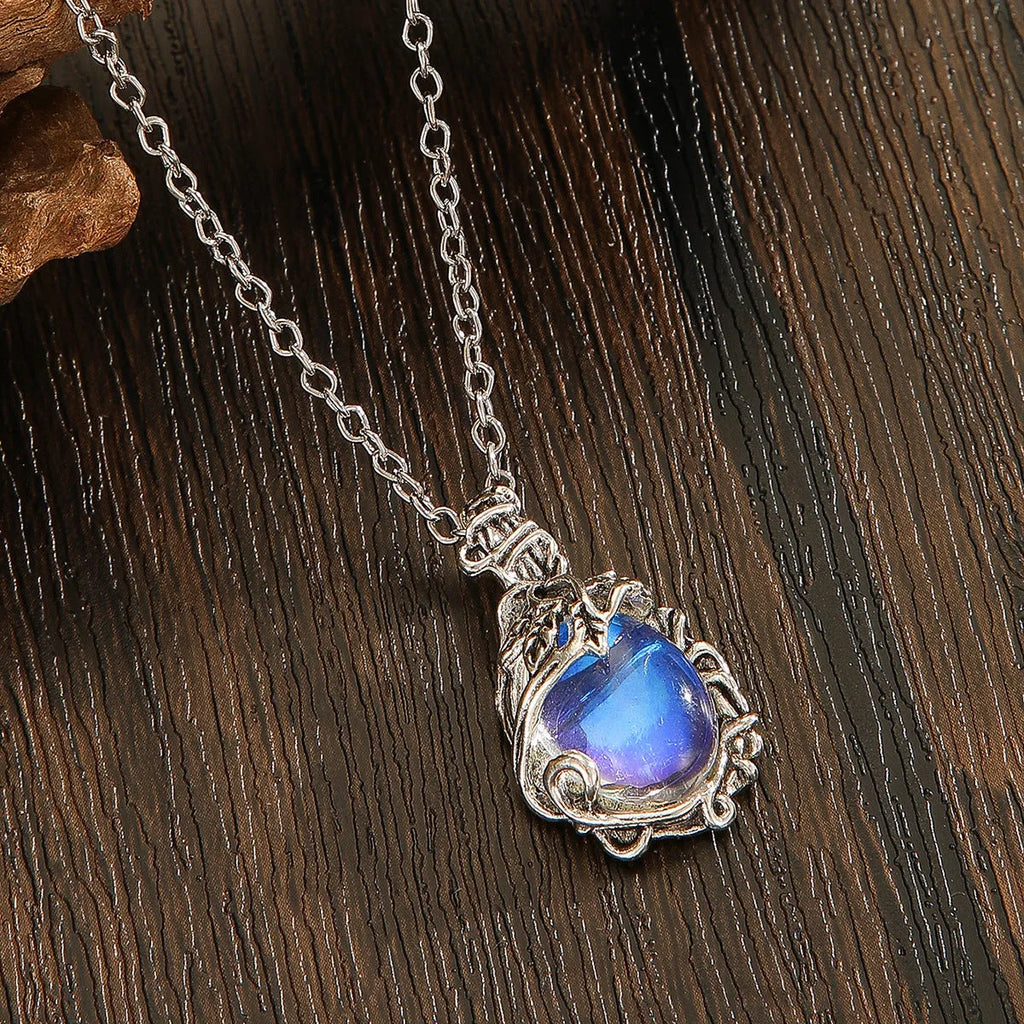 Moonstone necklace with oval cabochon pendant and silver-tone chain for weddings and everyday wear