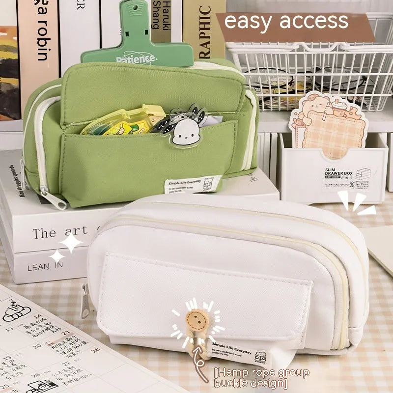 Girls canvas pencil case with button fastening showing large capacity for approximately 80 pens in beige colour