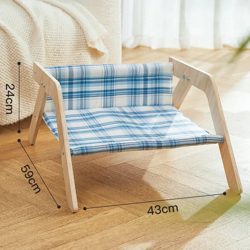 Wooden frame cat hammock bed with blue cloth in beach chair design for indoor cats.